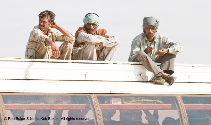 Men Sitting on Top of Bus, Bikaner