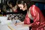 Heather Signing Wedding Contract