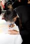 Kayvan Signing Wedding Contract