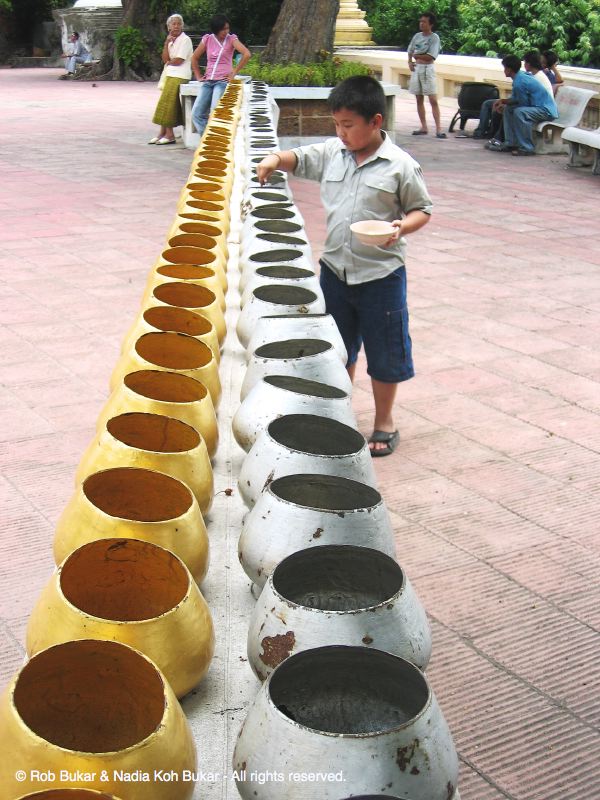 Boy Giving Prayer Money