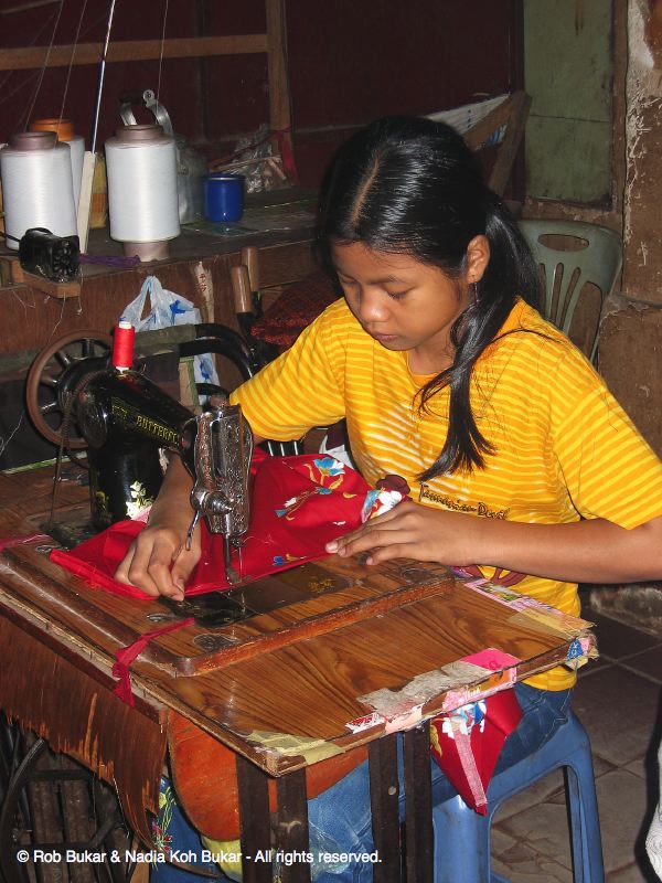 Cambodian Girl Sewing