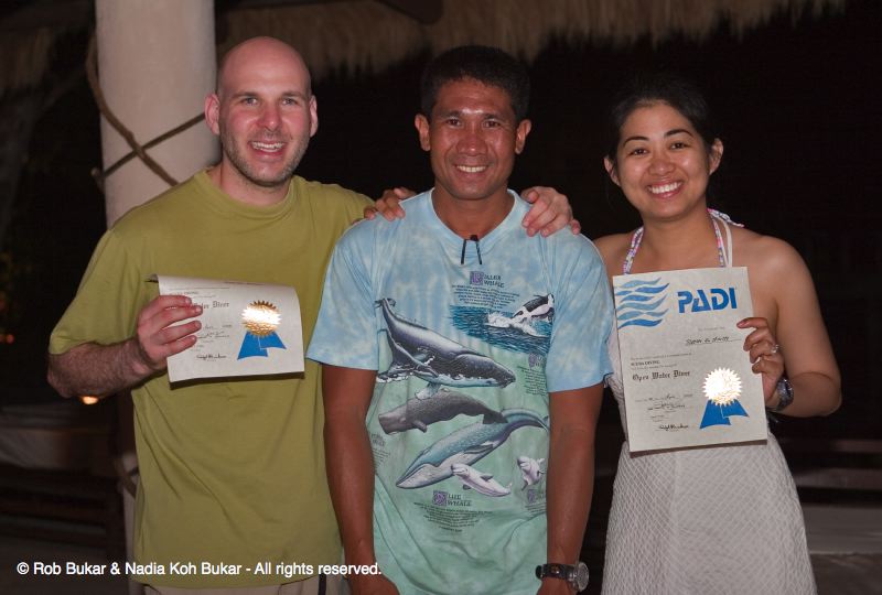 We're PADI Scuba Certified.  Photo with our Instructor, Arley