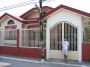 Kuya Raul in Front of House
