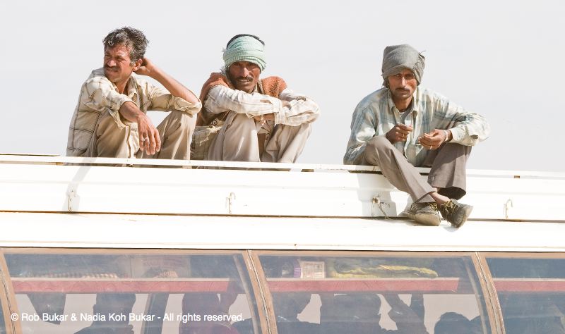 Men Sitting on Top of Bus, Bikaner